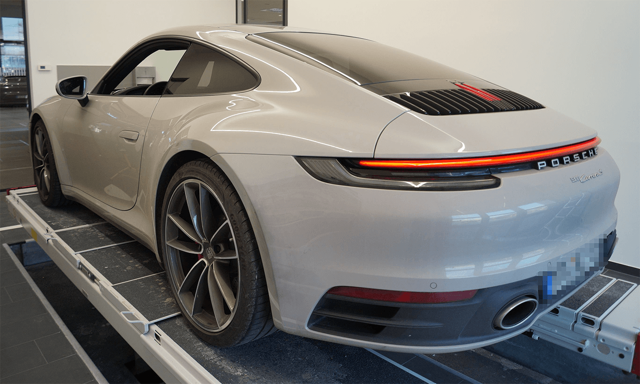 porsche_911_carrera_schaden_hinten_links